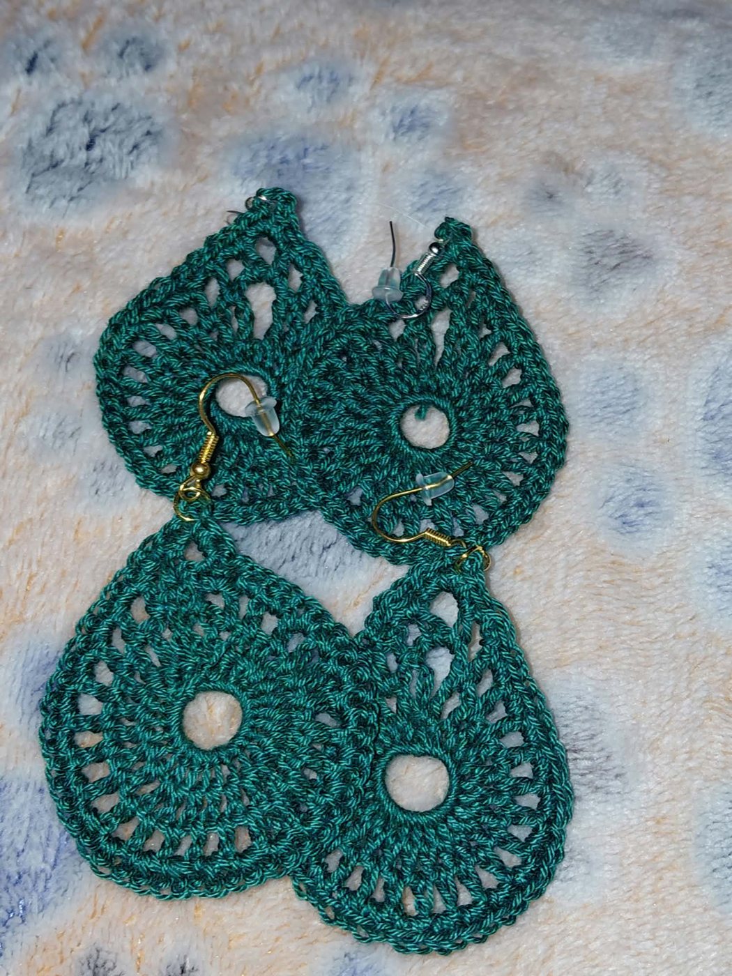 Two pairs of teal lace teardrop earrings
